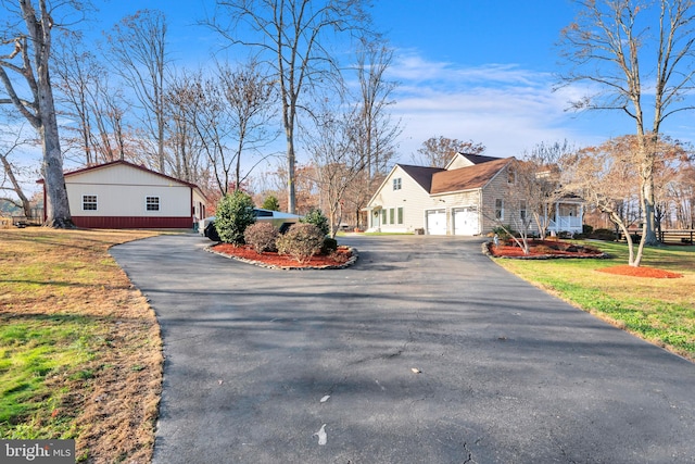 view of side of property featuring a lawn