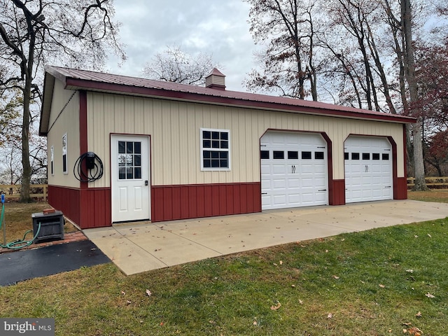 garage with a lawn