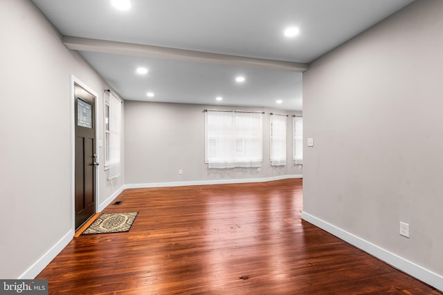 foyer entrance featuring dark hardwood / wood-style floors