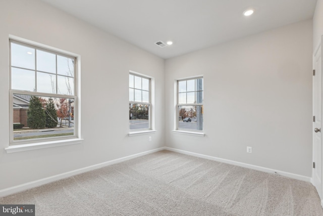 empty room featuring carpet floors