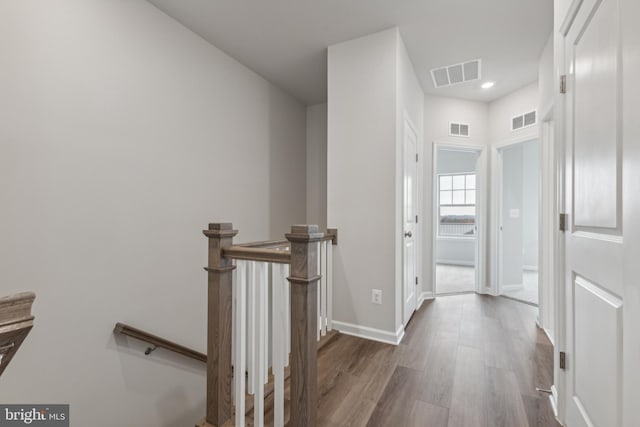 hallway with dark wood-type flooring