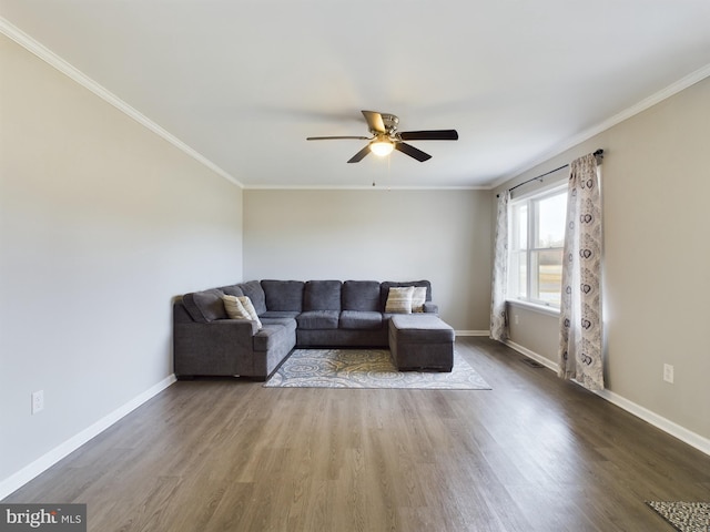 living room with ceiling fan, hardwood / wood-style floors, and crown molding