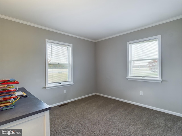 carpeted spare room with ornamental molding