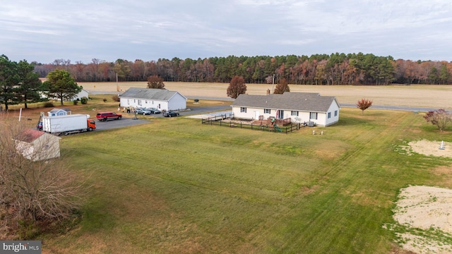 birds eye view of property featuring a rural view