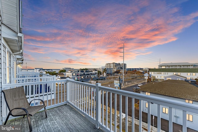 view of balcony at dusk