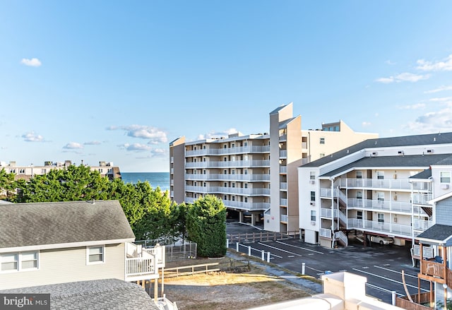 view of building exterior with a water view