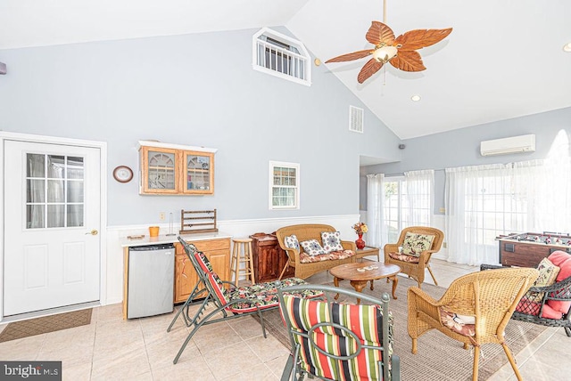 interior space featuring light tile patterned floors, high vaulted ceiling, a wall mounted AC, and ceiling fan