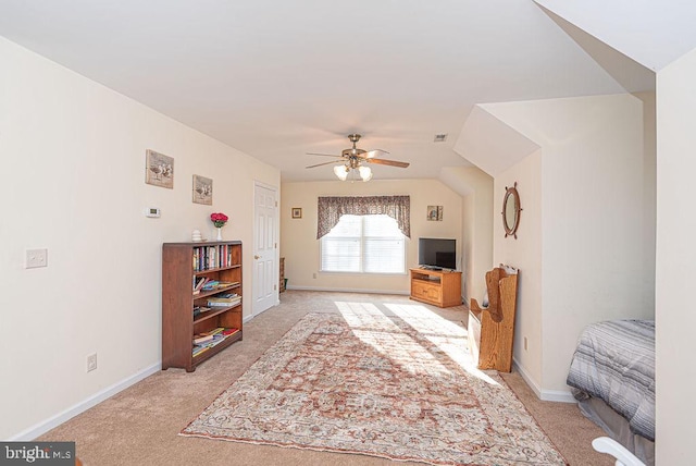 carpeted bedroom featuring ceiling fan and lofted ceiling