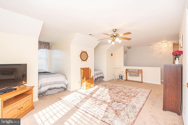 bedroom with ceiling fan and light colored carpet