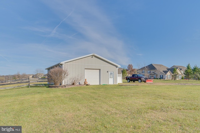 garage with a lawn