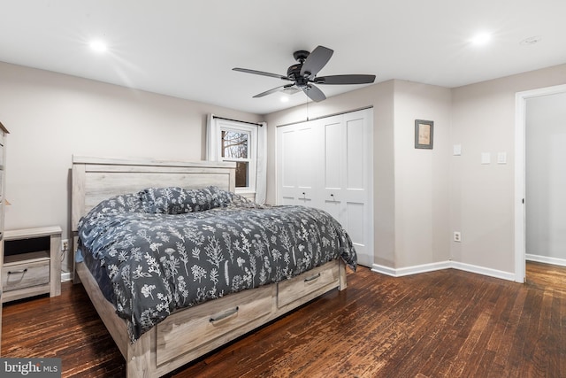 bedroom with a closet, ceiling fan, and dark hardwood / wood-style flooring