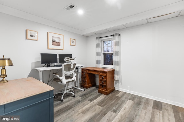 office space with hardwood / wood-style floors