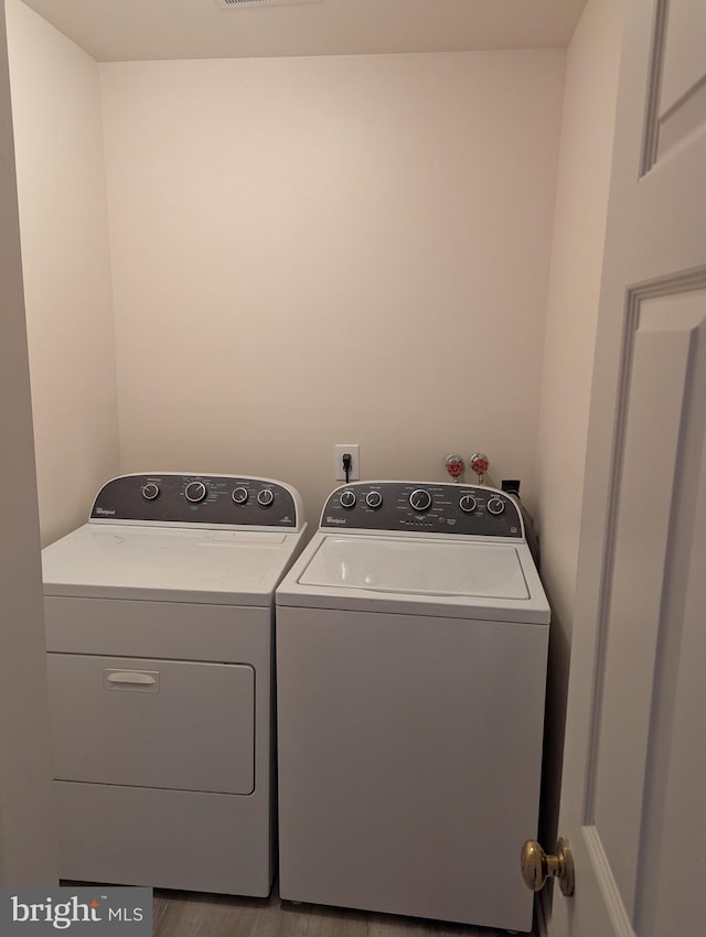 laundry area with washer and dryer