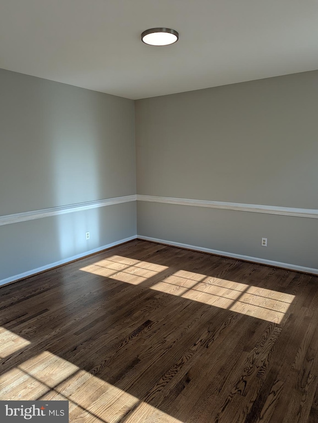 empty room featuring hardwood / wood-style floors