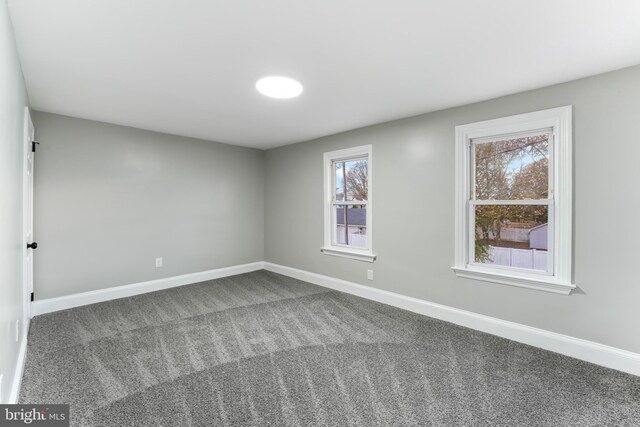 727 Clayton, New Castle, DE 19720 - empty room featuring baseboards and carpet flooring
