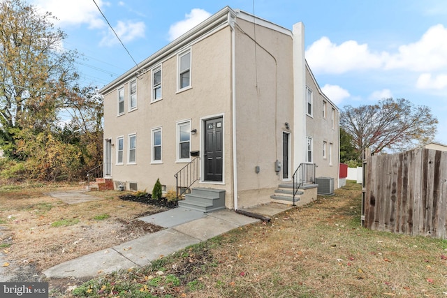 view of front of property with central AC unit