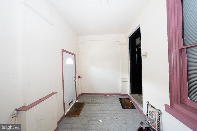 hall featuring wood-type flooring