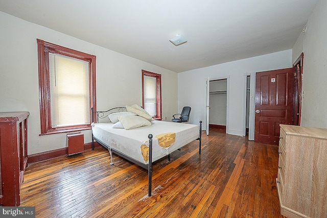 bedroom featuring dark hardwood / wood-style floors