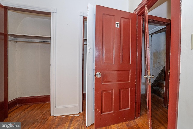 entryway with hardwood / wood-style floors