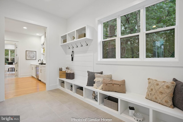 8202 Mockingbird Dr, Annandale, VA 22003 - mudroom with light tile patterned floors and recessed lighting