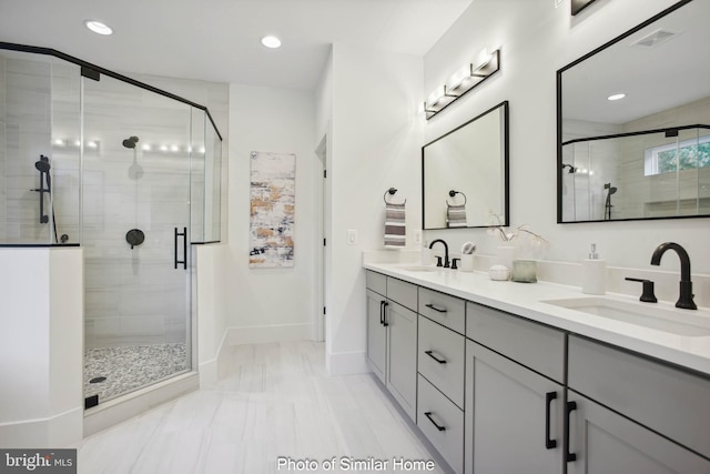 8202 Mockingbird Dr, Annandale, VA 22003 - full bathroom with a sink, marble finish floor, and a stall shower