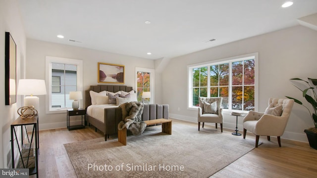 bedroom featuring light hardwood / wood-style flooring