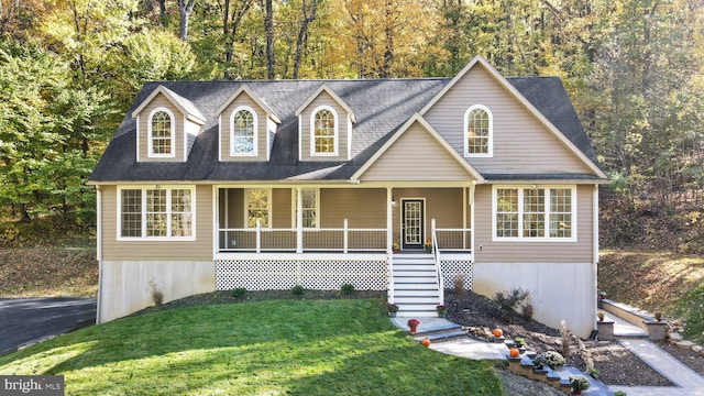 view of front of home featuring a porch and a front yard