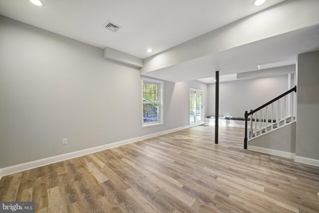 basement with wood-type flooring