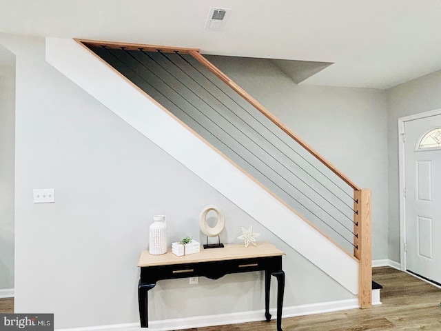 foyer entrance with wood-type flooring