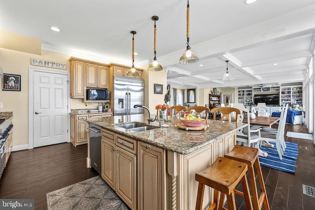 kitchen featuring built in appliances, sink, a kitchen island with sink, beam ceiling, and coffered ceiling