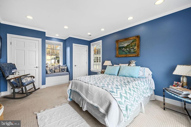 bedroom featuring crown molding and light carpet