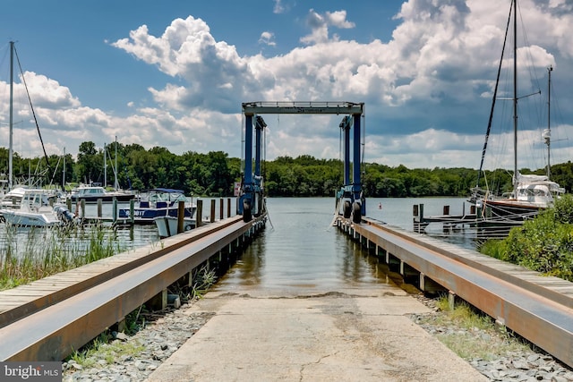 view of dock with a water view