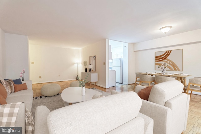 living room with light parquet flooring