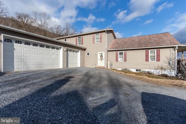 view of front of home featuring a garage