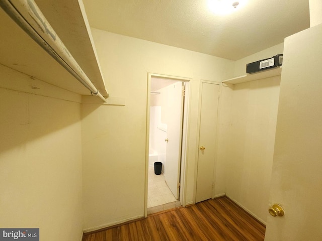 laundry room featuring dark hardwood / wood-style flooring