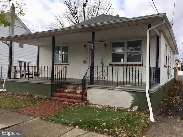 bungalow featuring covered porch