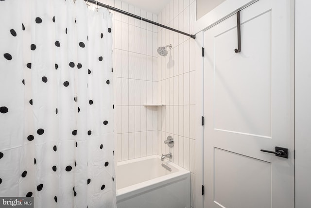 bathroom with shower / bathtub combination with curtain