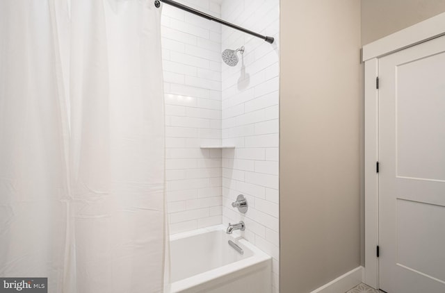 bathroom featuring shower / tub combo with curtain