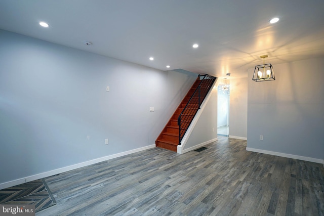 basement featuring wood-type flooring