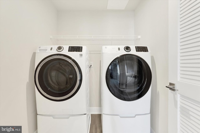 washroom with washer and clothes dryer