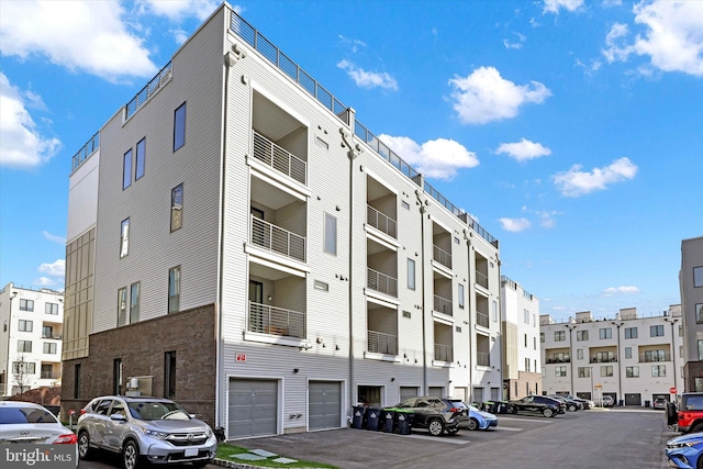 view of building exterior featuring a garage