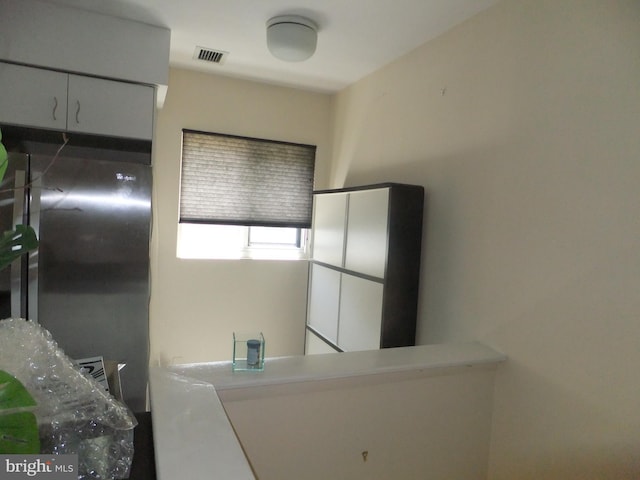 1710 Oakwood Ter Unit 3E, Penn Valley, PA 19072 - kitchen with white cabinets and light countertops