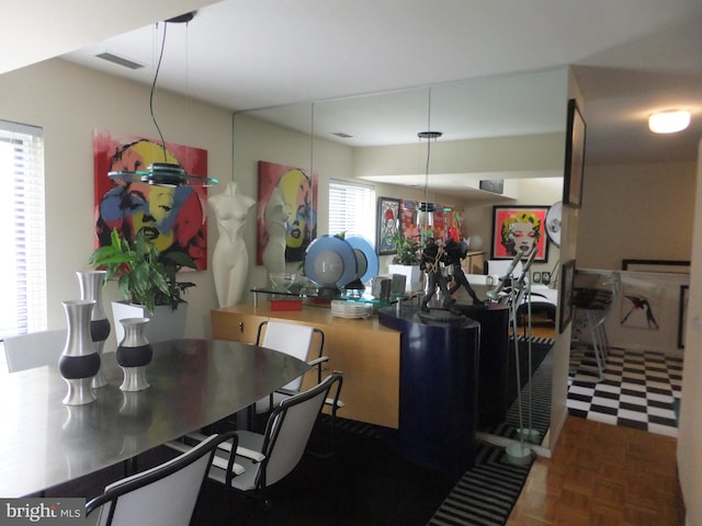 kitchen featuring dark parquet flooring