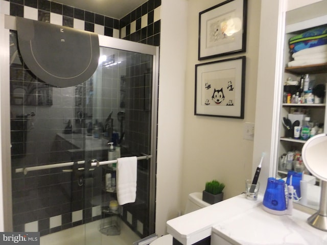 1710 Oakwood Ter Unit 3E, Penn Valley, PA 19072 - full bathroom with a shower stall, vanity, and toilet
