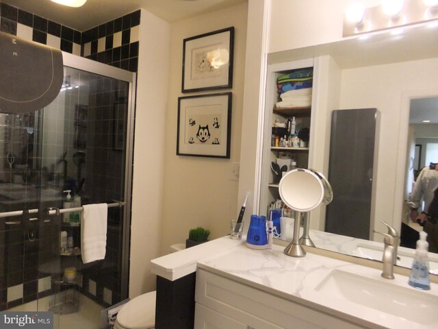 1710 Oakwood Ter Unit 3E, Penn Valley, PA 19072 - full bath with toilet, vanity, and a stall shower