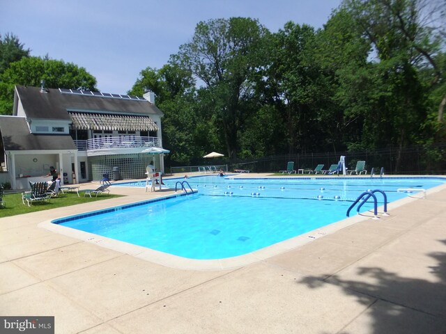 1710 Oakwood Ter Unit 3E, Penn Valley, PA 19072 - community pool with a patio