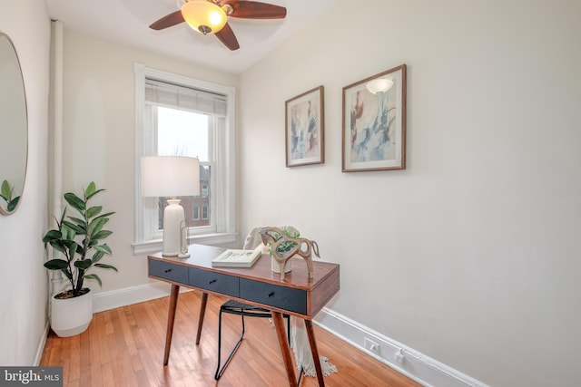 office space featuring hardwood / wood-style floors and ceiling fan