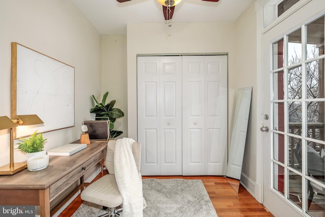 office area featuring ceiling fan and light hardwood / wood-style floors