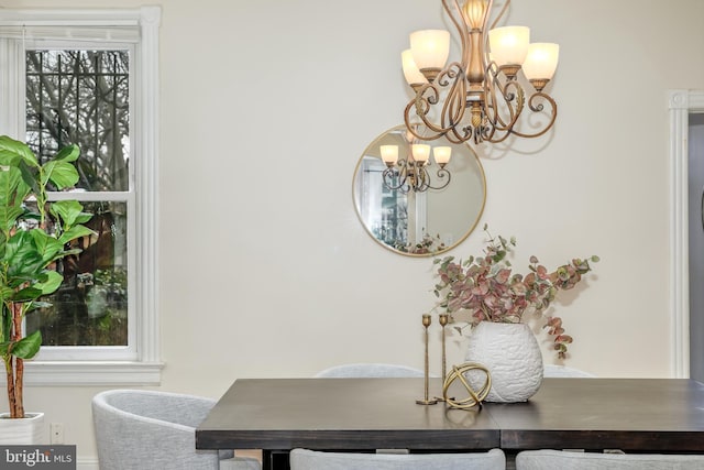 dining room with a chandelier