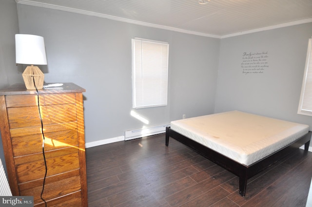 bedroom featuring ornamental molding, dark wood-type flooring, and a baseboard heating unit